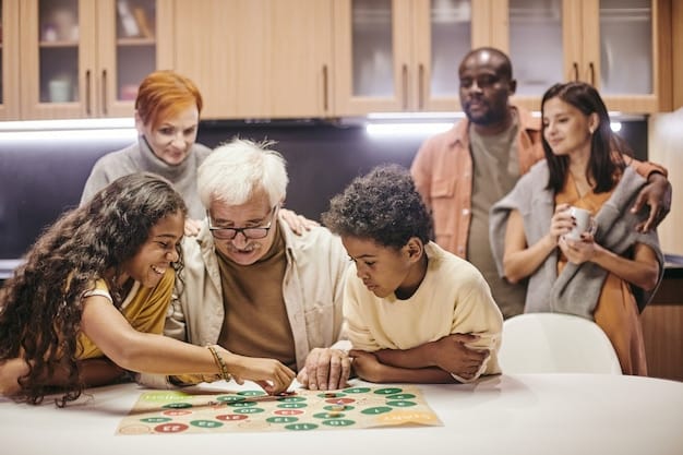 A diverse group of people, including children, teenagers, and adults, are gathered around a table playing a board game. The atmosphere is lively and joyful, with everyone smiling and laughing.