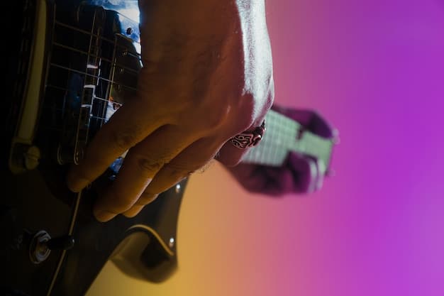 A player's hands executing a difficult chord sequence on a Guitar Hero controller, with a focus on the precise finger placement and strumming technique. The game screen displays the corresponding note chart with near-perfect accuracy.