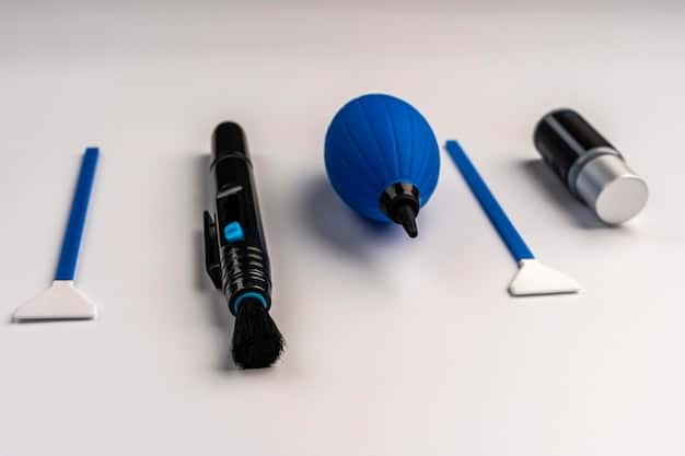 Close-up of various console cleaning tools, including microfiber cloths, compressed air canister, small brushes, and isopropyl alcohol in a spray bottle. Arrange the items neatly on a clean surface.